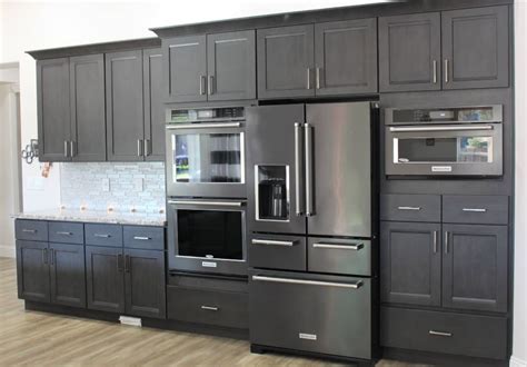 black stainless steel with black cabinets|black stainless steel color schemes.